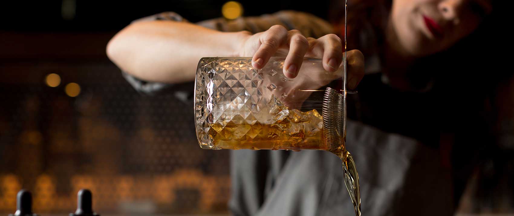 bartender pouring drink